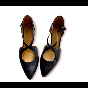 Black leather low heel shoes